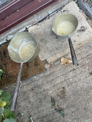 Two brass iron - iron, pans