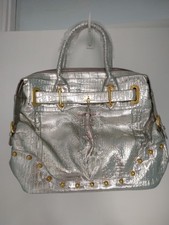 Butler and Wilson Silver