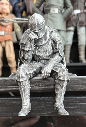 Sad knight sitting ledge - sitting, a