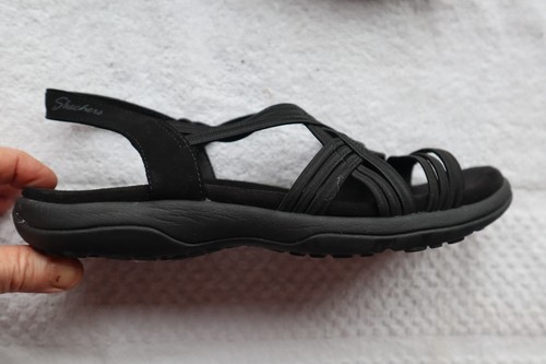 Black synthetic textile - &,