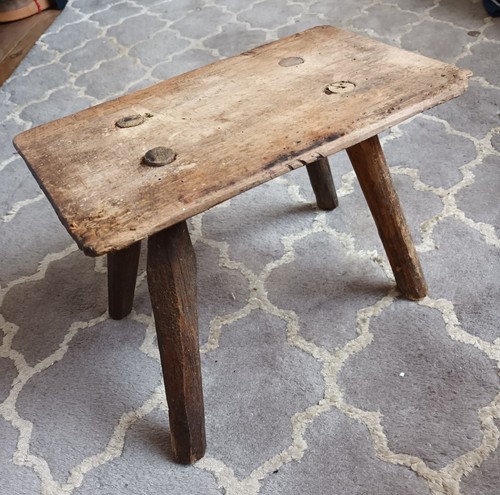 Antique wooden milking stool