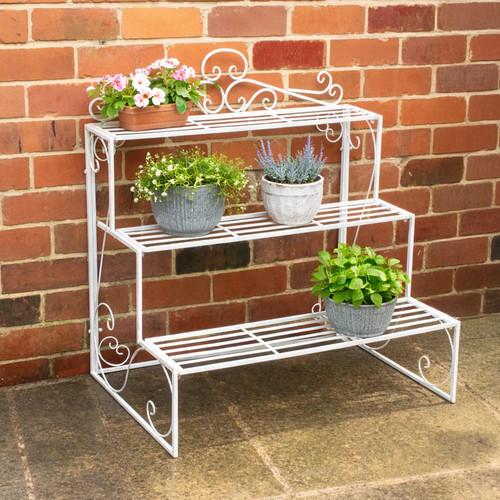 Distressed white metal three - metal,