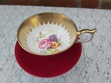 Aynsley hand painted flower Footed Red cup and mismatched saucer 