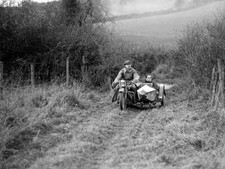 Sunbeam and sidecar competing