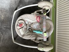 Bright Starts Comfort and Harmony Cozy Kingdom Portable Baby Swing