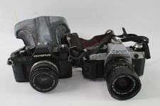 SLR Vintage Film Cameras Inc Olympus OM40 & Canon AE1 Both w/ Lenses x 2