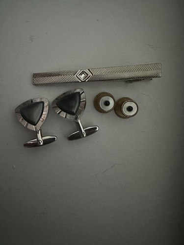 Set two cufflinks - of, and