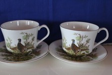 Elizabethan China Two large Cups and Saucers