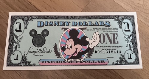 One disney dollar note - one,