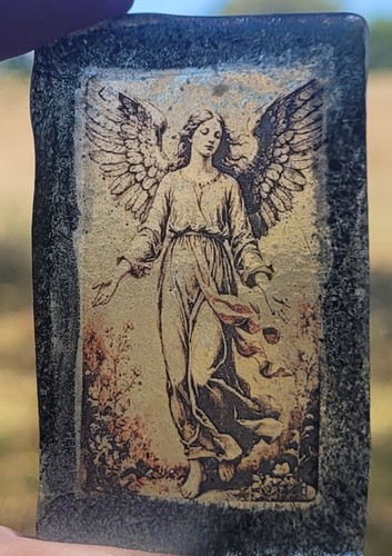 Angel kiln fired piece for