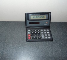 Vintage 1980s CASIO SL-100B Solar Powered Wallet Calculator Good Condition