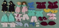 Pair of Twin Dolls with a Complete Knitted Wardrobe for each Doll