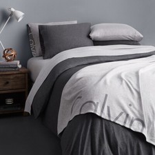 Discontinued Calvin Klein Modern Bedding Light Grey Throw