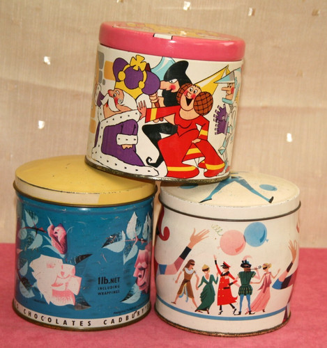 Three vintage round tins - round,