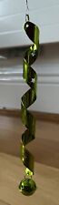 Lime green metallic spiral festive decoration with bell