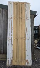 A SET OF VERY TALL RECLAIMED