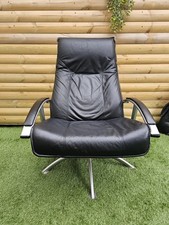 Mid Century Modern Chair.  Retro Danish leather swivel recliner chair by Kebe. 