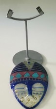 Coloured Glass Mask On Grey Metal Stand