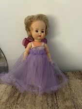 Vintage Dolls wearing bespoke clothing made by court dressmaker to Queen Mary