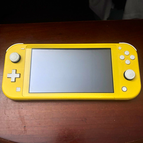 Nintendo switch lite yellow - nintendo,
