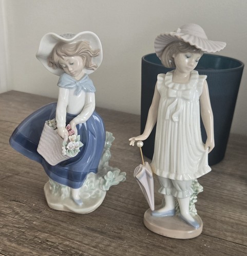 Lladro girl with flower - with,