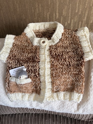 Hand knitted guilet - hand, baby