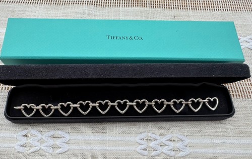Tiffany clasping hearts - tiffany,