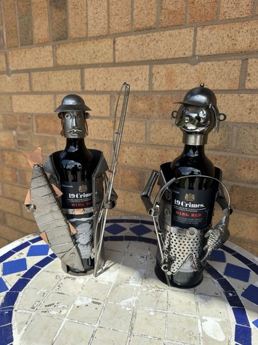 Metal smiling fisherman wine - metal,