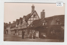 WARWICK  A street  scene with Black & white Houses / people RP