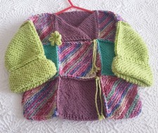 * HAND KNITTED MULTI-COLOURED