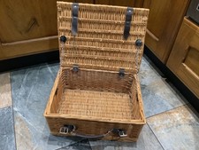 Wicker picnic hamper style basket. Leather straps and handle
