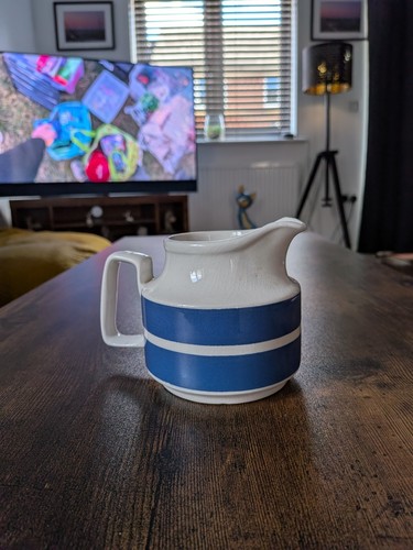 Milk jug the style tg - of,