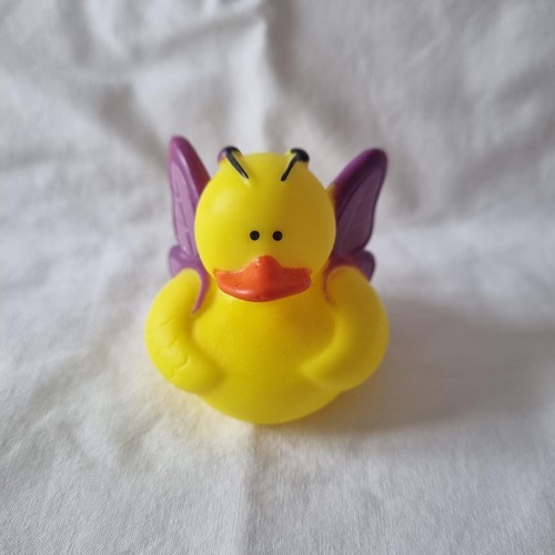Yellow rubber duck with purple - rubber,