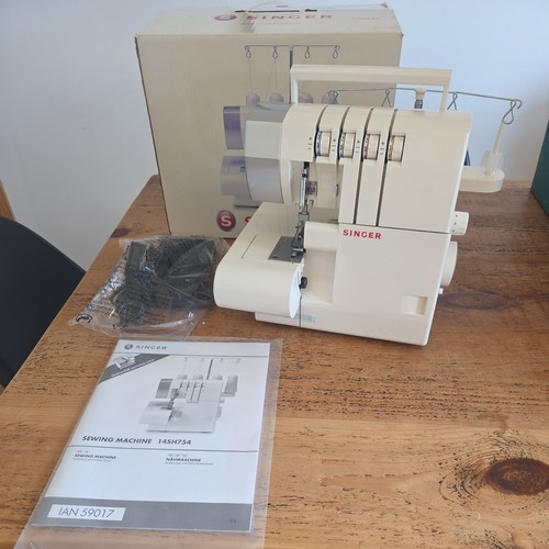 Brand new boxed - boxed, singer