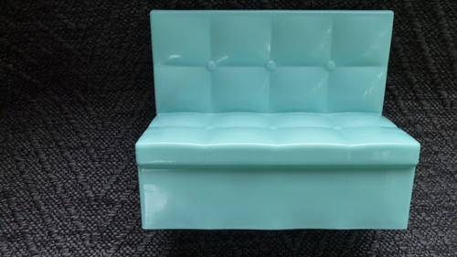 Blue plastic doll sofa