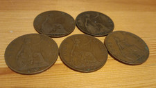 Five historic British pennies