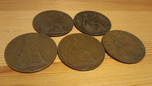 Five historic british pennies - five,