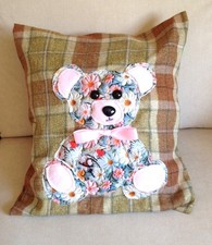 hand crafted tartan cushion with handsewn applique of a teddy Bear