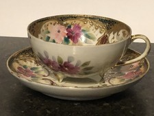 STUNNING ANTIQUE JAPANESE PORCELAIN FLORAL DECORATED FOOTED CUP & SAUCER
