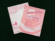 Two tutor books, 1 x E flat