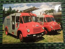Colour photo of two Bedford A3 - HCB hose reel tender fire engines.