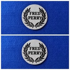 A Pair Of White Fred Perry Mod