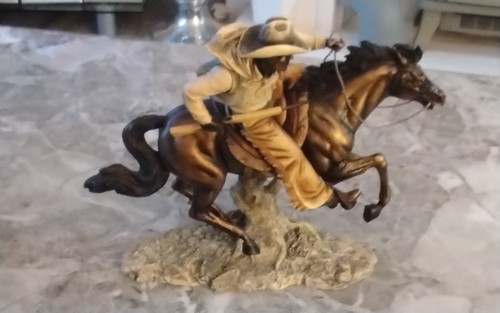 Resin cowboy horseback made - on,