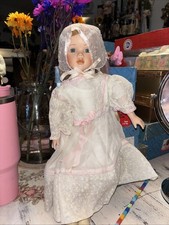 Collectible porcelain doll. 15