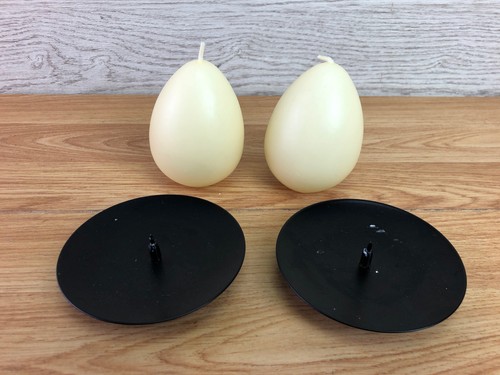 Egg shaped candles with - shaped,