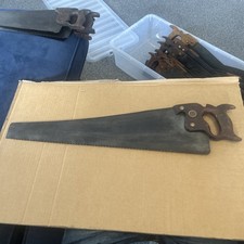 VINTAGE HAND SAW "WARRANTED