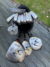 NICE SET OF WILSON FAT SHAFT GOLF CLUBS IN A WILSON STAND BAG. FREE 48 HOUR POST