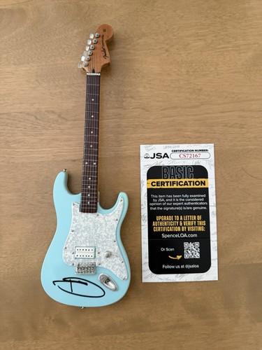 Autographed tom delonge - autographed,