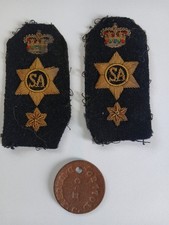 Military Epaulettes and dog tag.