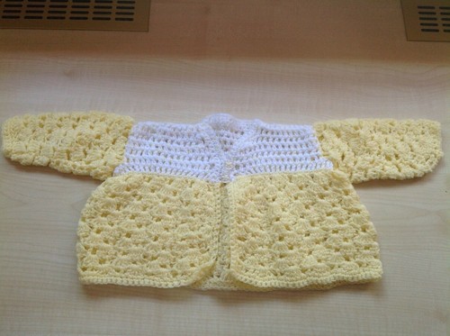 Hand knitted baby - hand,
